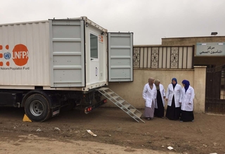 The medical team of the UNFPA Mobile Delivery Unit in Al-Mamoun District in West of Mosul, Iraq