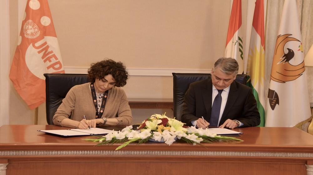 UNFPA Representative, Dr Rita Columbia and Head of DMI, Dr Jutiar Adil signing MoU - 2022/ © DMI Photo -