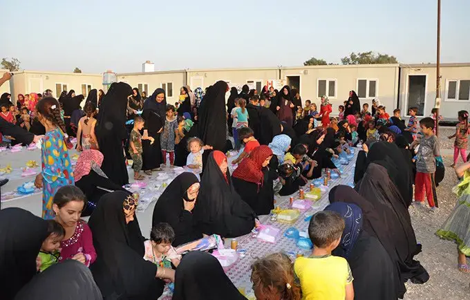 “Hosting a bigger family”: Displaced Iraqis come together for Ramadan 